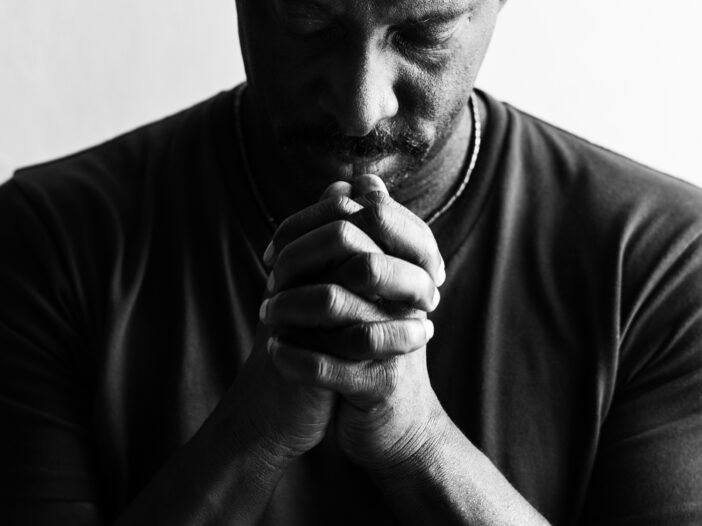 black man in prayer