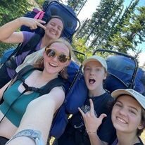 youth taking a selfie on a camping trip in the boundary waters